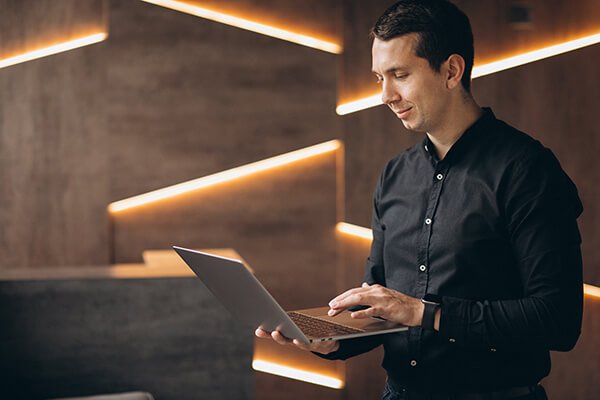 handsome-business-man-working-computer-office (1)